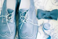 11 ice blue groom’s shoes, a matching bow tie look very stylish