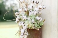 14 a cotton, green hydrangeas and branch decoration will fit any space of your wedding venue