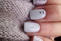 14 silver glitter manicure with white nails and rhinestones looks very tender and chic