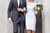 15 a bateau neckline long sleeve knee wedding dress with a scallope edge is ideal for a city hall ceremony
