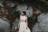 15 a gorgeous high low wedding dress with a turtleneck, illusion bodice and sleeves and a chic skirt