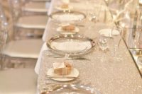 15 a silver wedding tablescape with lots of sparkles looks really wow