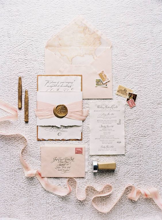 blush wedding stationery with watercolor prints, blush ribbons and seals for a sweet and chic wedding