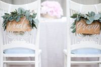 15 cute wooden signs with fresh eucalyptus are a chic idea for any wedding