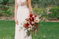 18 a blush wedding gown with a plunging neckline, no sleeves and a sequin bodice to stand out in pale winter shades