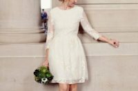 18 a lace wedding dress with a scoop neckline, long sleeves with brown leather strappy heels for a modest bride