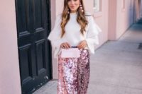 18 a pink sequin midi skirt with a white edge, a white angora sweater with ruffled sleeves, pink earrings and nude heels