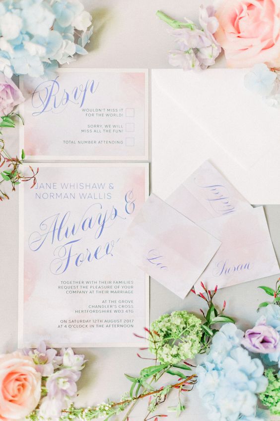 watercolor blush wedding stationery with blue calligraphy is a chic spring or summer idea