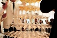 19 a champagne tower is exactly what you need to surprise and excite your guests