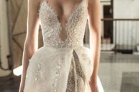 19 a fantastic textural lace and bead spaghetti strap wedding dress with a covered plunging neckline and a rhinestone overskirt for the ceremony
