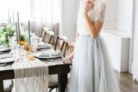 24 a chic bridal separate with a short sleeve lace top and a flowy grey skirt for a fashion-forward bride