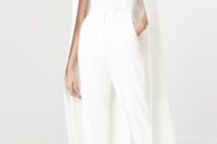 26 a bridal jumpsuit with a plunging neckline, pockets and a cape attached looks trendy