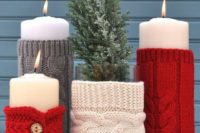 26 knit candle covers in neutrals, red and grey for gorgeous wedding table decor