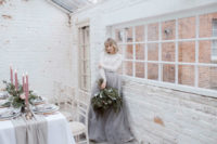 27 a modern bridal separate with a white long sleeve top and a grey tulle skirt for a bride who loves minimalism