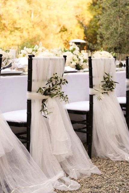 white airy fabric with olive branches with olives are ideal for a Tuscany wedding
