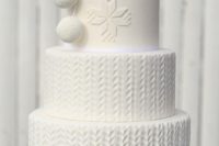 31 a gorgeous knit cake with edible pompoms and traditional knit patterns