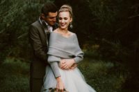 31 a grey off the shoulder sweater and a white tulle skirt for a cozy feel at your winter wedding