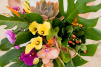 01 The wedding bouquet was a gorgeous tropical one, with tropical leaves, callas and orchids