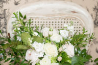 02 The bridal bouquet was done of blush and white blooms and lots of greenery