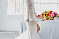 02 The bride was wearing a separate with a white sequin top and long sleeves, a creamy skirt with a train and an asymmetrical slit