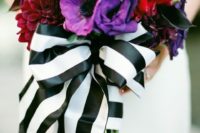 02 striped black and white ribbon with a large bow to make the bouquet stand out