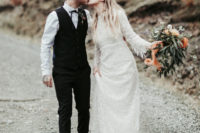 03 The second bridal look was done with a boho lace wedding gown with fringed sleeves