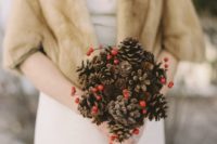 03 a pinecone wedding bouquet with berries can  be easily DIYed and won’t wither