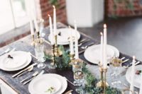 03 an airy table runner, an evergreen one and gilded candle holders and gold rim glasses