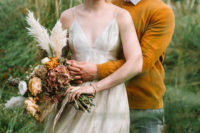 04 The bride was wearing a spaghetti strap silk wedding dress, the groom was wearing a mustard sweater and grey printed pants