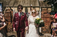 04 The groom was wearing a 60s inspired burgundy three-piece suit with a printed tie
