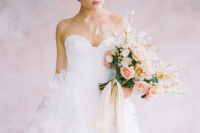 05 The ethereal bridal bouquet was done with blush roses and some airy touches