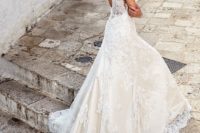 05 a romantic sleeveless lace wedding dress with an open back and a train