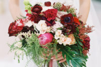 06 The wedding bouquet was bold – red, pink, blusha and cream and with a tropical twist – some tropical leaves in it