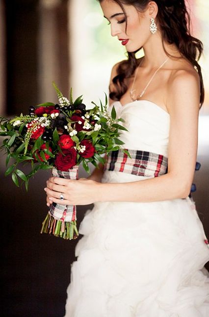 a plaid bouquet wrap that matches the bridal sash is a great idea for a Scottish wedding