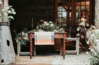 08 The wedding tablescape is done with a plaid runner, fall-like florals and vintage glasses
