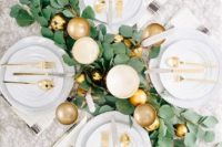 08 a glam tablescape with a foliage table runner, gold ornaments and glasses