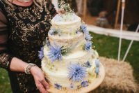 09 The wedding cake was made by the groom’s mother, it was topped with blue flowers and letters