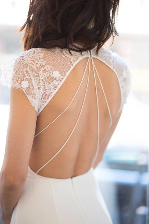 an open back with lace shoulders and a cool line detail catches an eye and looks sexy