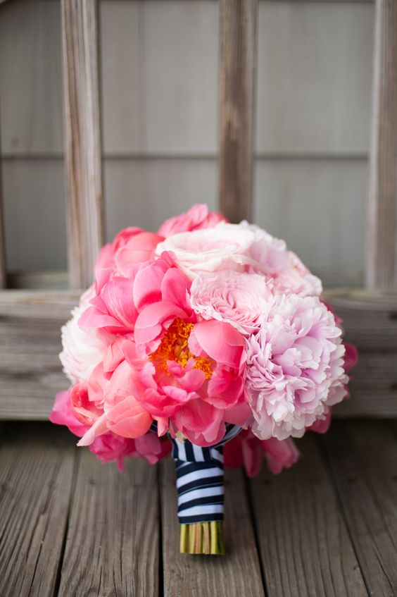 navy and white striped ribbon for a bold pink peony bouquet and a nautical bride