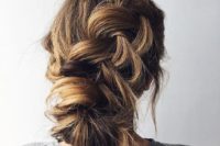 14 a casual messy braided low updo with bangs is ideal for those brides who don’t want much mess
