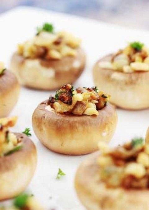 stuffed champignons with ham, cheese and greenery are amazing as finger food