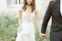16 a chic and feminine wedding gown with a lace bodice, cap sleeves and an illusion plunging neckline