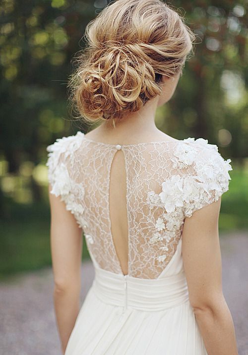 an ethereal sheer lace back with lace appliques and a cutout