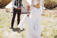 20 a boho lace wedding dress with long sleeves, a whimsy cutout back and a train