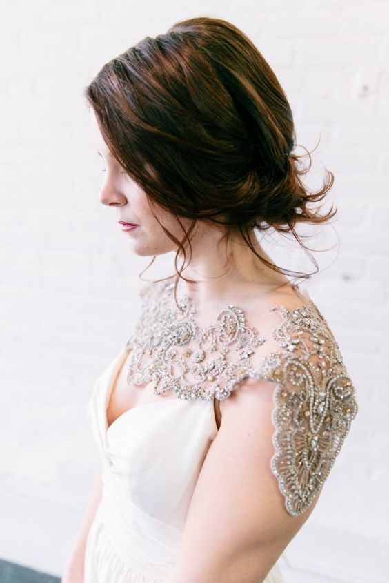 a bold shoulder jewelry piece with rhinestones and sequins for a deep V neckline dress