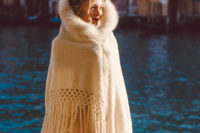20 cover up with a warm piece with faux fur as it can be chilly in Venice
