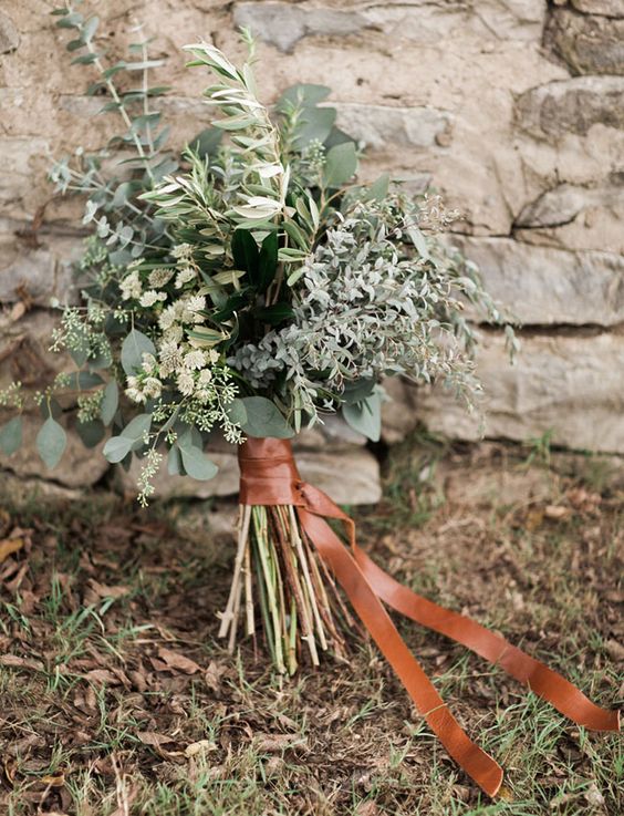 a leather wrapped greenery bouquet for an industrial or modern bride