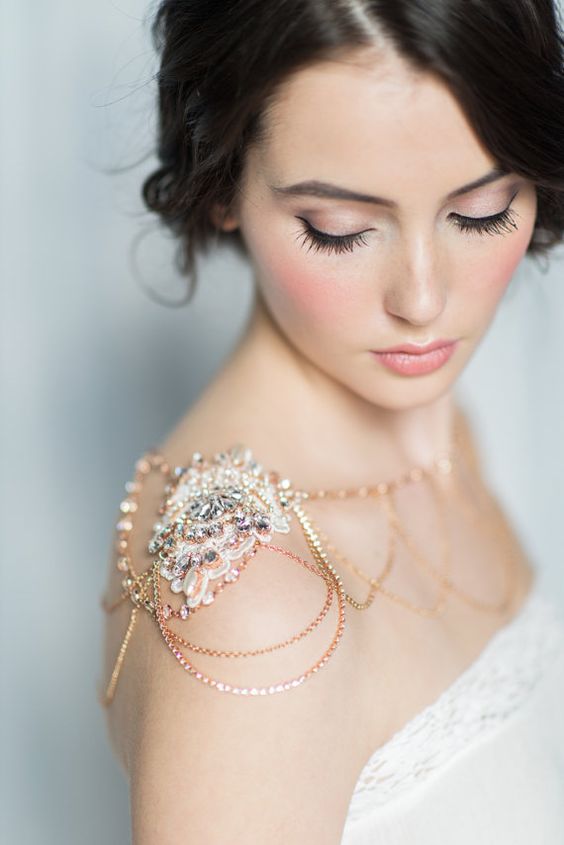 rose gold shoulder piece with rhinestones for a chic bridal look
