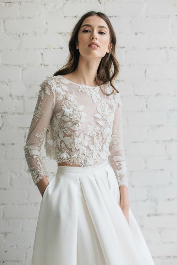 a sheer top with appliques and beading looks very romantic and edgy at the same time