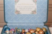 24 a vintage suitcase with Christmas ornament for sign-in is a cool alternative to a guest book